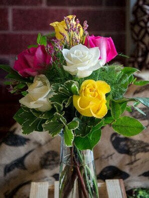 Half Dozen Colourful Roses In a Vase